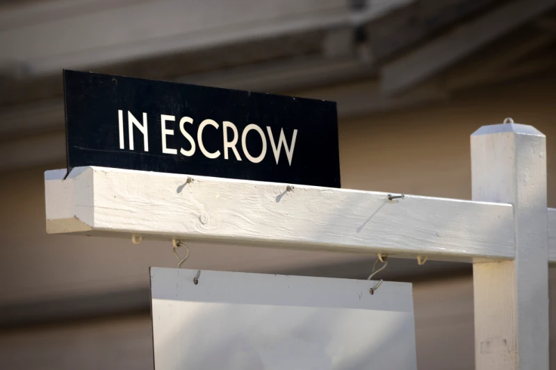 In escrow sing